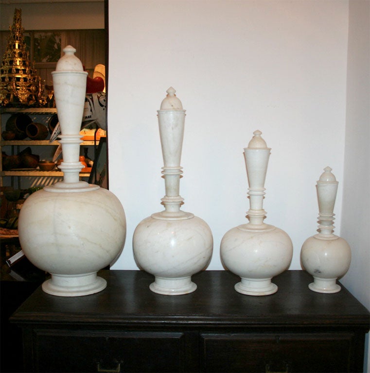 A fluted neck white marble bottle with cap from India. 4 sizes: 12