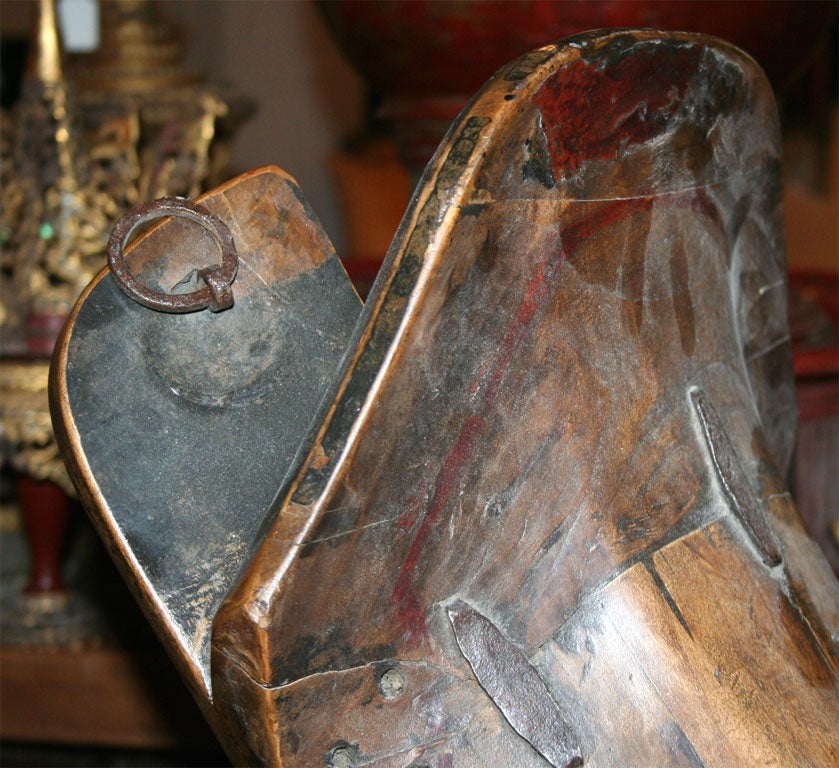 A Chinese horse saddle on a stand at 1stDibs