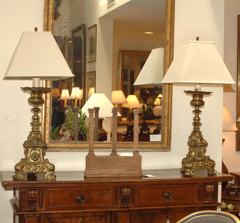 A Large Pair of Antique Candlestick Lamps