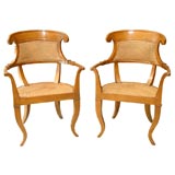 Pair of Caned wood armchairs