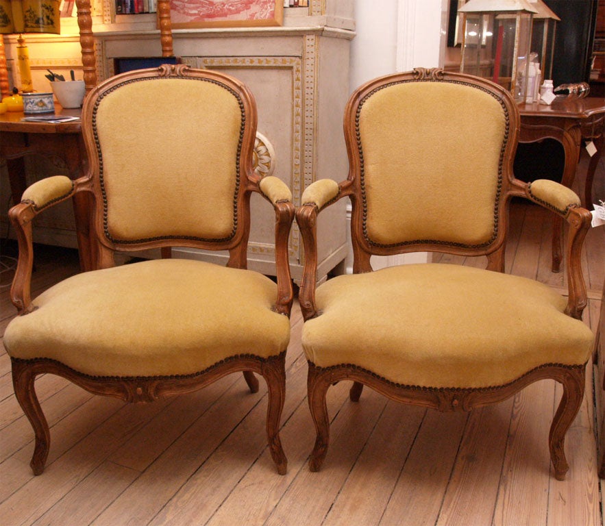 Pair of Louis XV walnut Fauteuil with cabriolet legs