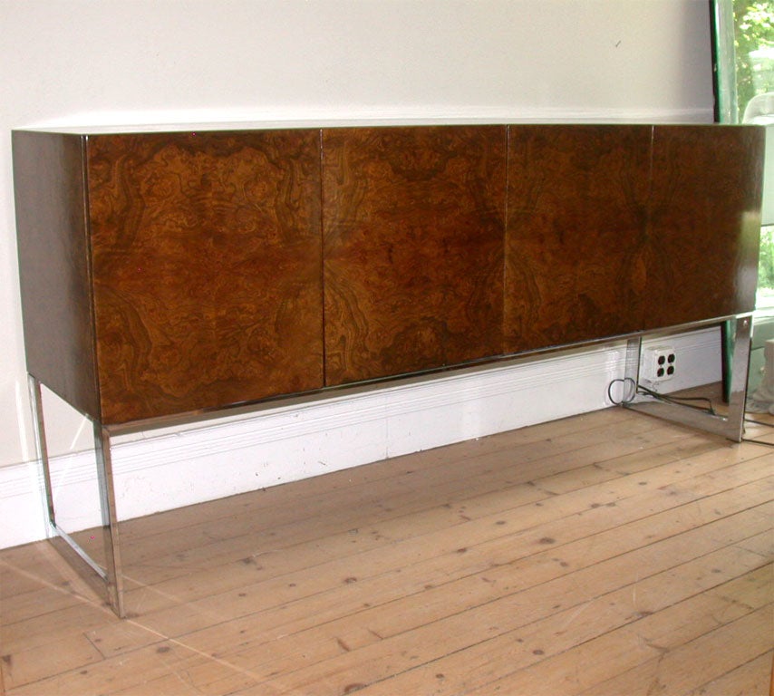 Milo Baughman burlwood sideboard on a chrome base - lined silverware drawer and shelf