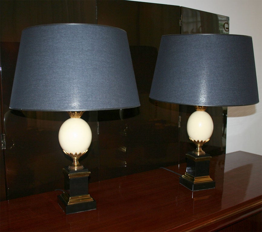 “Ostrich Egg”<br />
Pair of brass & bronze Lamps by Maison Charles.<br />
Unsigned.