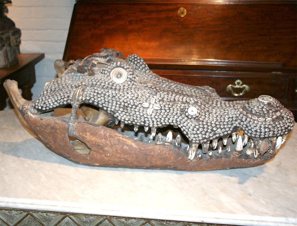 Large Ceremonial Crocodile Head Inlaid with Wood, Shells, and Cowerie Shells