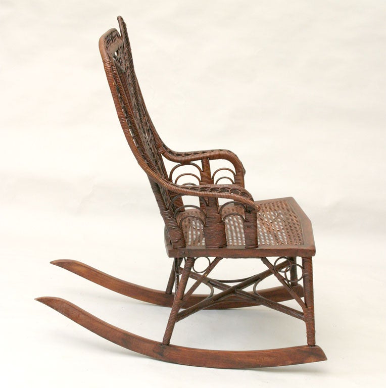 American Victorian Banjo/Harp Motif Wicker Rocking Chair