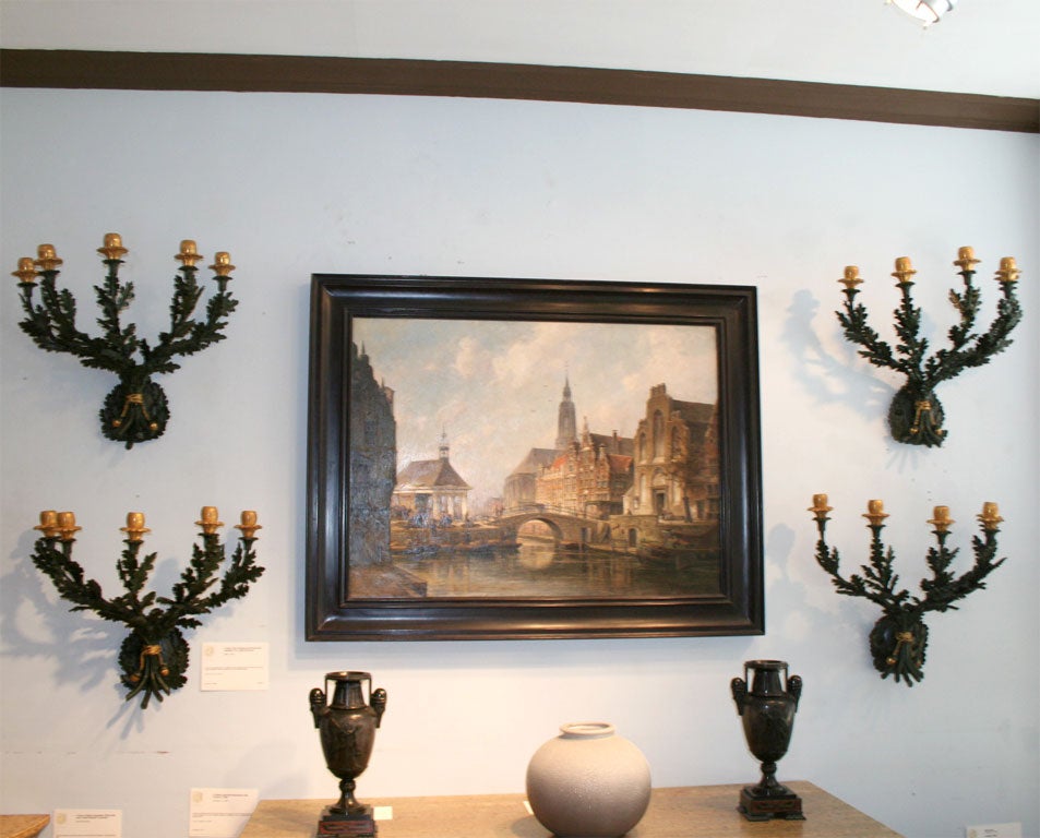A Set of Four Painted and Parcel Gilt Venetian Five Light Sconce