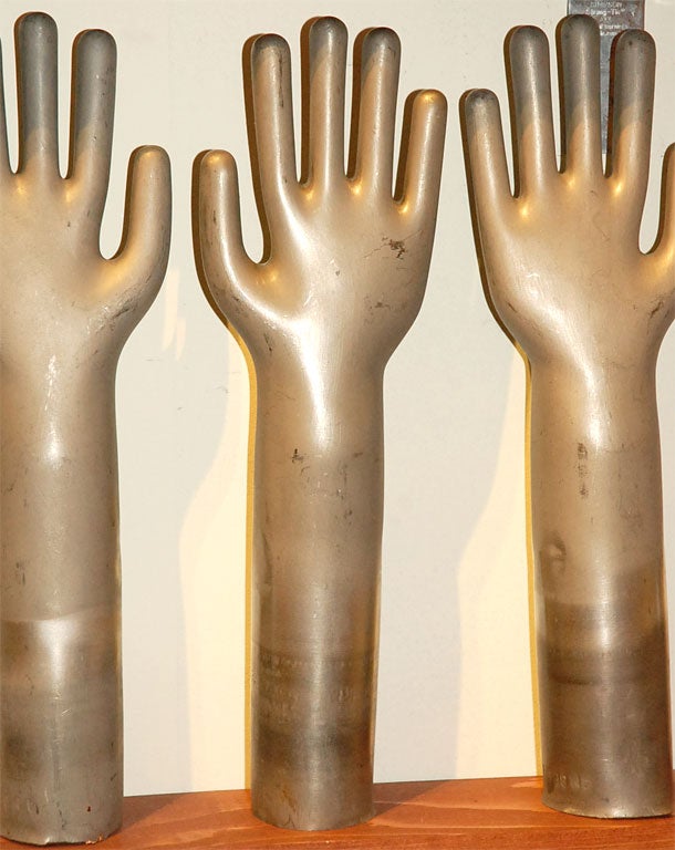 Belgian Collection of galvanised copper hands: glove moulds