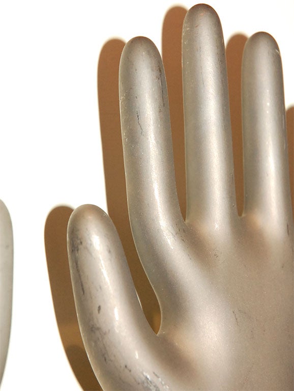 Collection of galvanised copper hands: glove moulds 2