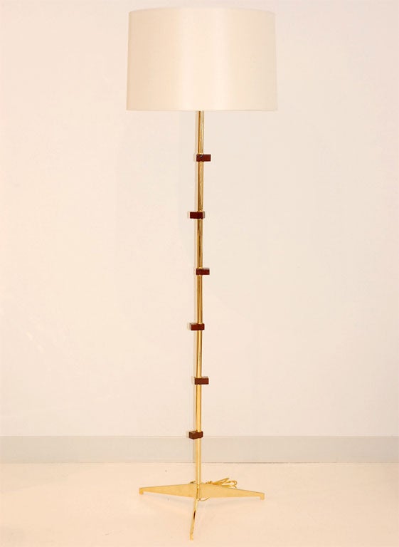 A 22K Gold Finished Floor Lamp with Resin Detail and Silk Shade