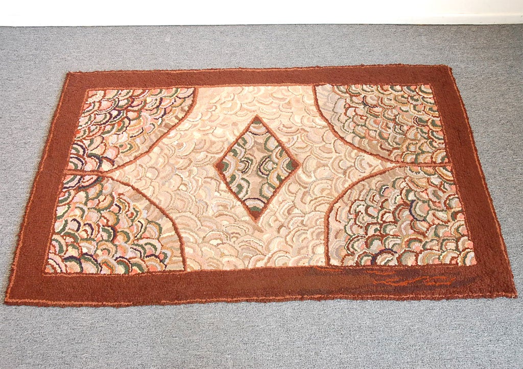 1930s hand-hooked rug with clam shell pattern in mint condition and wonderful colors, great size.