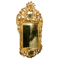A Fine Venetian Giltwood Mirror