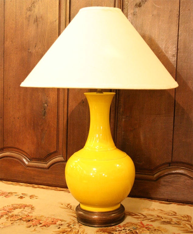 Chinese Yellow Porcelain Vase with excellent profile and subtle raised ring decoration, now mounted as a lamp on wooden base.