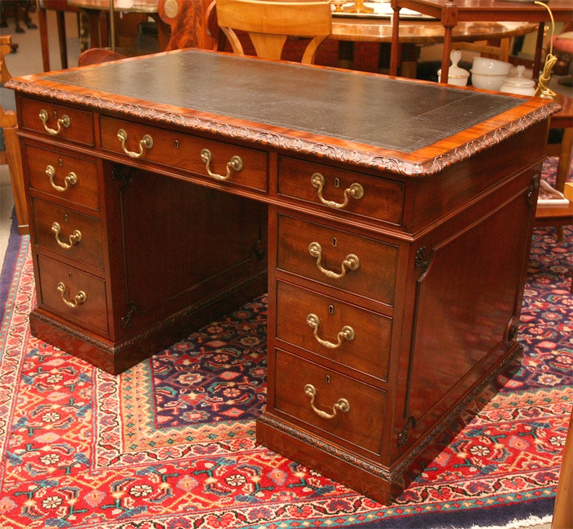 English Pedestal desk. Great carved details old leather top. Mahogany. Circa 1800-10
