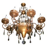Bagues eight light gilt iron chandelier