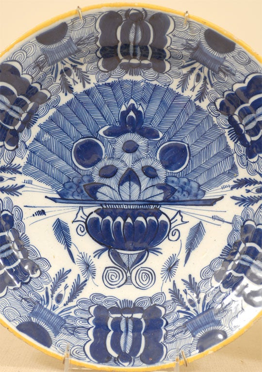 A matched pair of Large18th Century Dutch Delft "Peacock" Plates