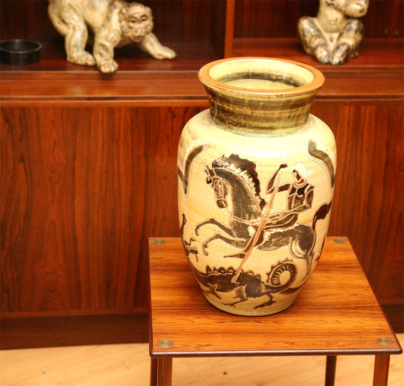 Large pottery vase from the Danish pottery factory, Knapstrup, signed by H.F. Gross, depicting St. George and the Dragon, in a yellowish green glaze