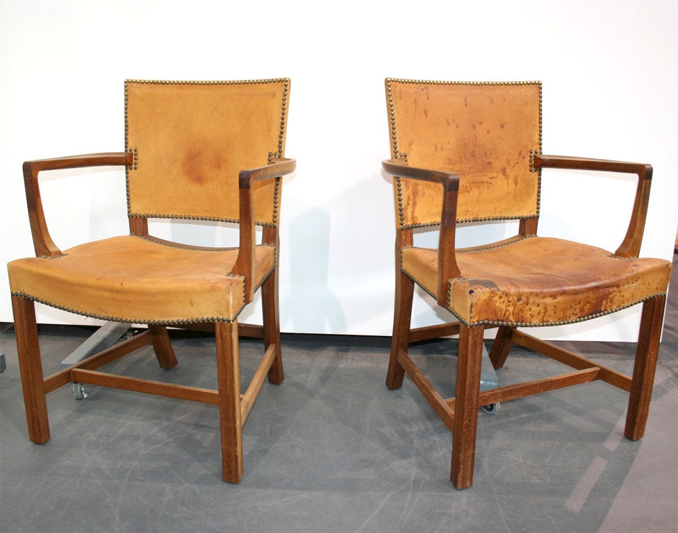 Vintage 1940s occasional armchairs.

An early pair of mahogany armchairs designed by Kaare Klint and manufactured by Rudolf Rasmussen. These chairs are upholstered in original Niger leather showing typical patina for their age. Please see the
