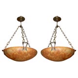 A pair of alabaster light fixtures