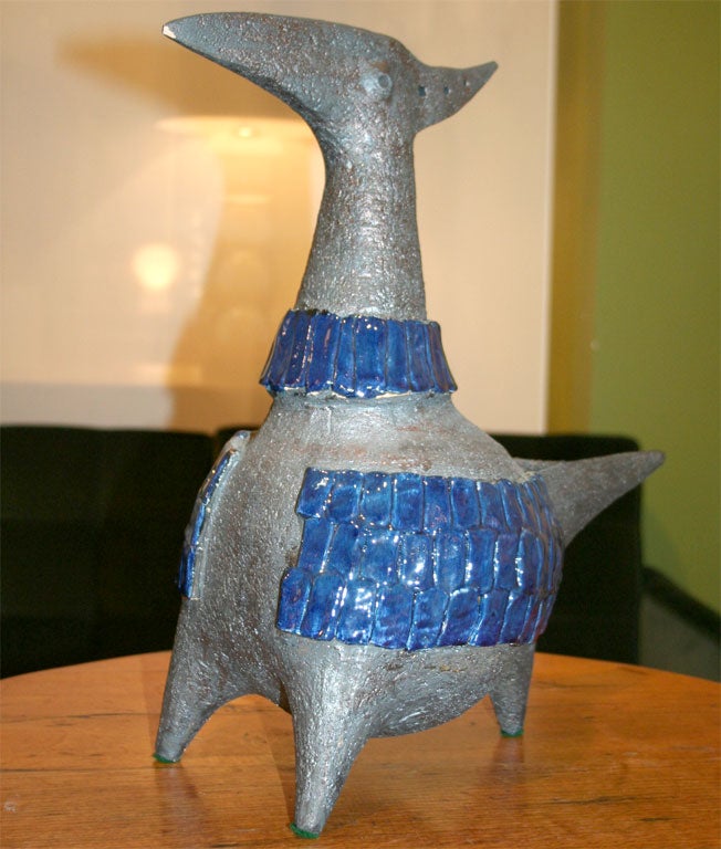 Original contemporary work by Dominique Pouchain; abstract animal sculpture in unglazed and blue glazed ceramic; signed.
