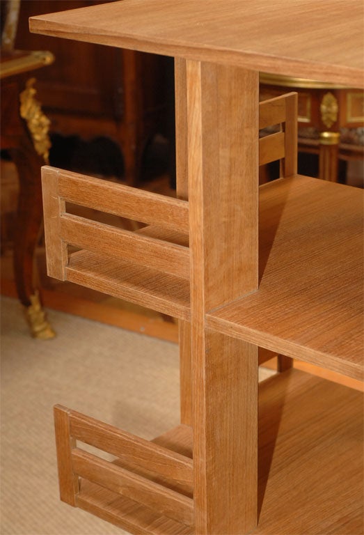 Teak revolving bookcase, in the style of Charlotte Perriand at 1stDibs