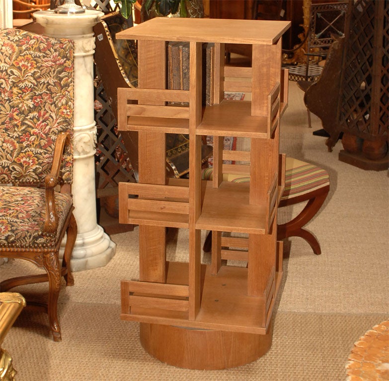 Teak revolving bookcase, in the style of Charlotte Perriand at 1stDibs