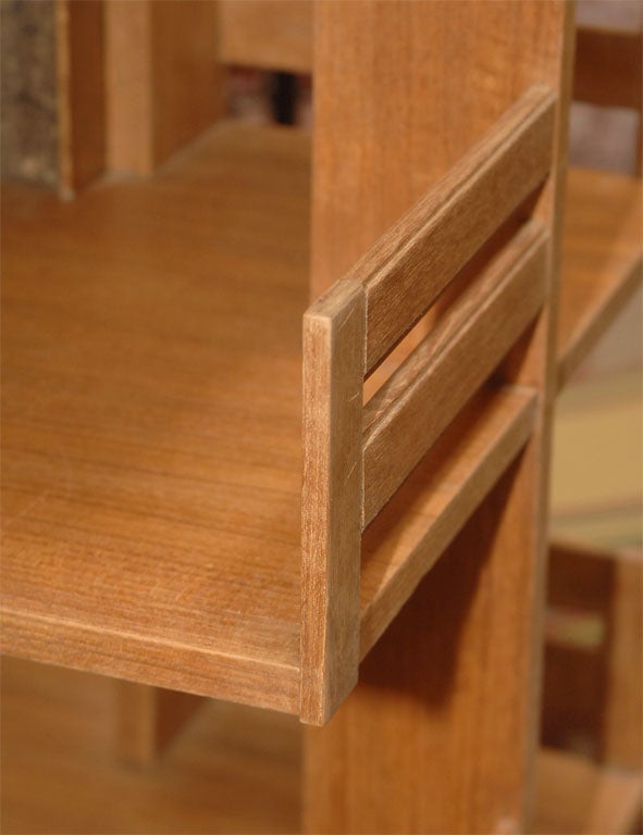 Teak revolving bookcase, in the style of Charlotte Perriand at 1stDibs