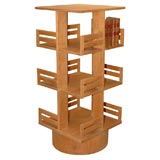 Teak revolving bookcase, in the style of Charlotte Perriand