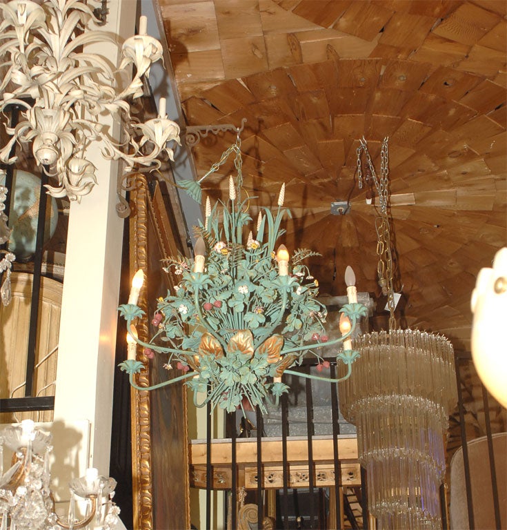 Elaborate Hand painted tole chandelier with eight lights, gilt accenting and hand painted flowers, berries, shafts of wheat.