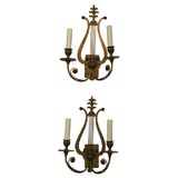 pair of brass lyre shaped sconces