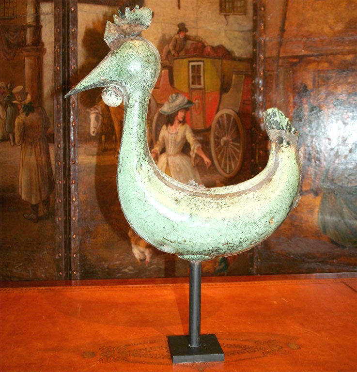 Eighteenth Century French Verdigris Copper Rooster Weather Vane from a Church Bell Tower on a Later Stand <br />
<br />
12 1/2 inches long x 4 1/2 inches deep x 22 inches high