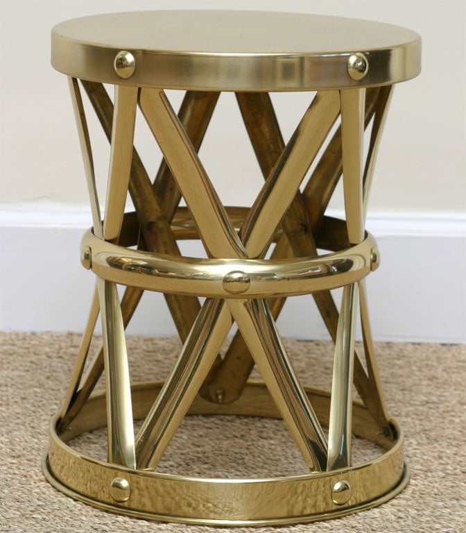 Polished brass X form bamboo like garden stool.