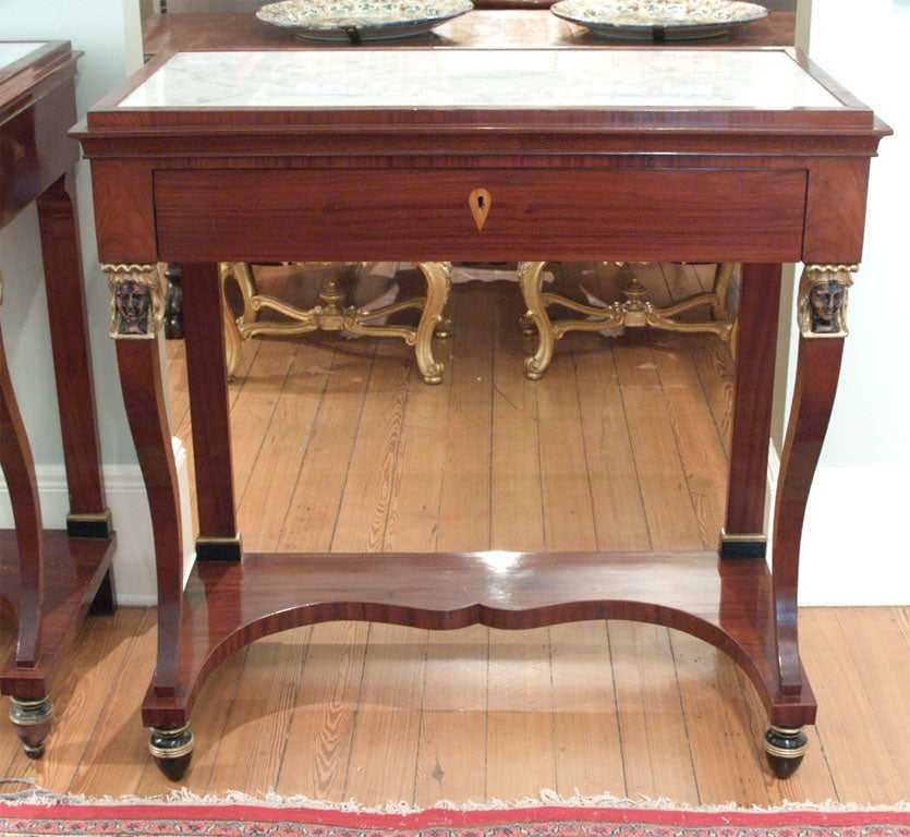 Pair of Italian Empire Classical Consoles with inset marble tops.