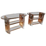 Pair of oval lucite side tables