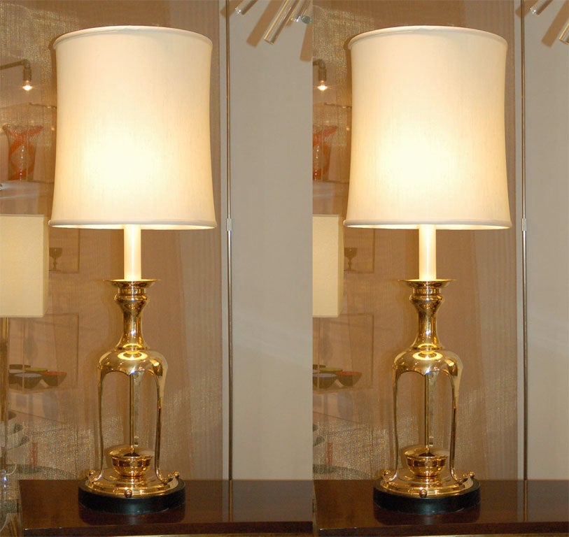 Large pair of lamps in the style of James Mont.  ***Contact/Shipping Information: AOL (American Online) users may experience difficulties sending emails to us or receiving emails from us. If you have made an inquiry to us and have not received a