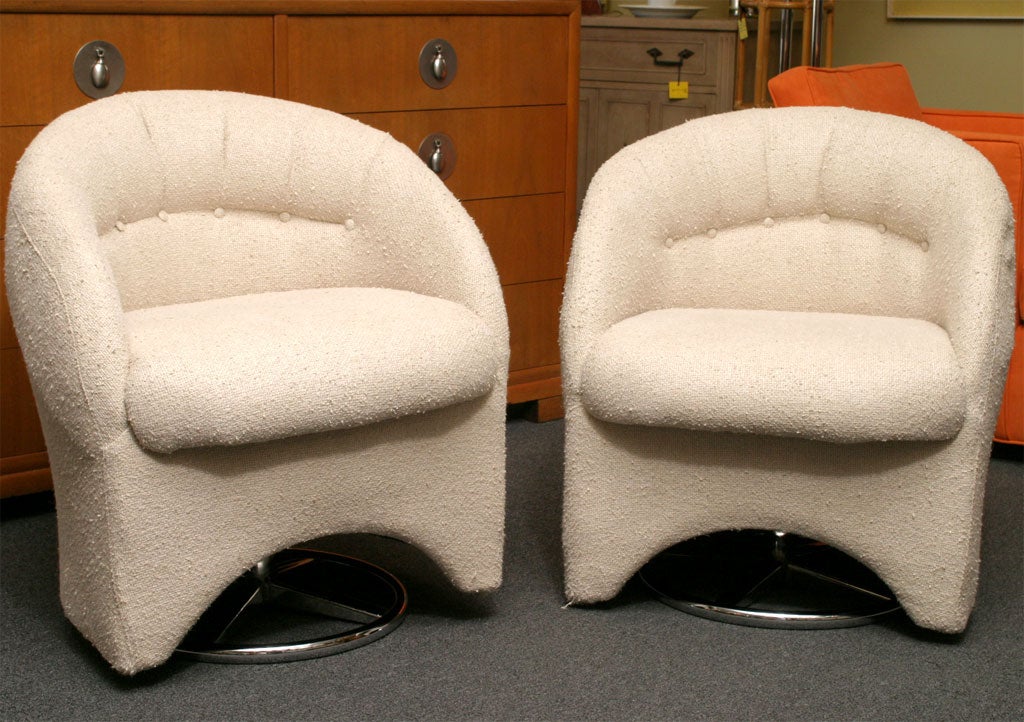 SOLD JANUARY 2010 From Finland, a pair of 1970's slipper tub chairs on swivel chrome bases.  Designed by Eide of Norway, they have tufted back styling in a soft nubby fabric.  New upholstery.  Diminutive scale hard to find.  REDUCED FROM $1,100.