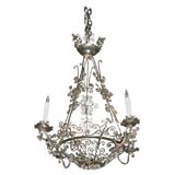 Spanish iron fretwork four-light chandelier