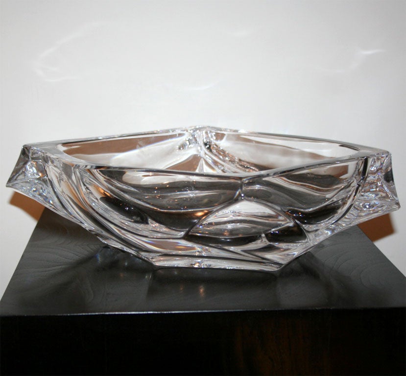 Beautiful crystal fruit dish by Daum. It is signed Daum on the bottom. The modern lines and sharp angles give this Mid-Century piece a contemporary feel. The dish is a substantial piece.