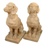 PAIR OF OLD CARVED LIMESTONE DOGS, PROBABLY GOLDEN RETRIEVERS