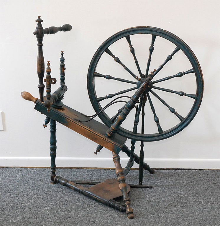 18th century original blue painted spinning wheel in great condition. Wonderful turnings and fantastic surface. The spinning wheel was probably painted in the first quarter of the 19th century and is the best paint you could ever find. The metal