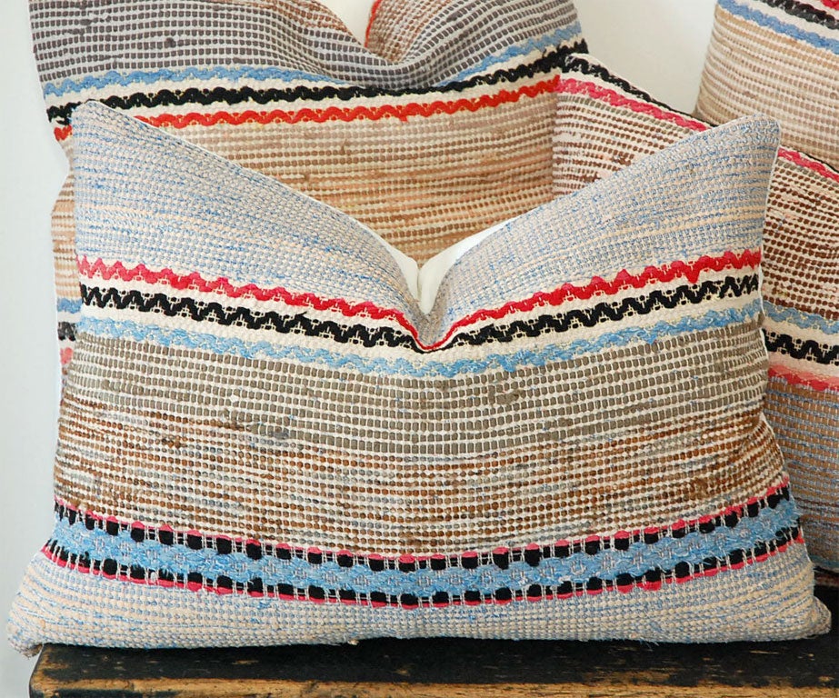 American 1930'S RAG RUG PILLOWS W/ SNAKE PATTERN ON A TAN GROUND