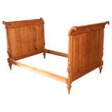 Antique French finely carved fruitwood daybed.  Charles X.