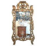 Antique French gold leaf and painted mirror. Antique French gold leaf and painted mirror.