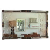 Large etched mirror with faceted frame, and Empire details