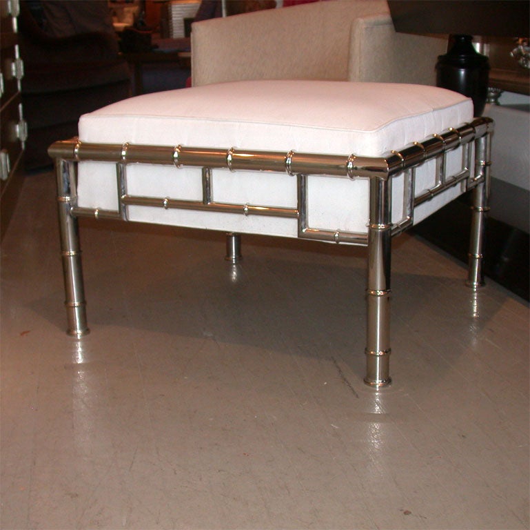 UNUSUAL CHROME FINISHED BAMBOO DETAILED UPHOLSTERED OTTOMAN