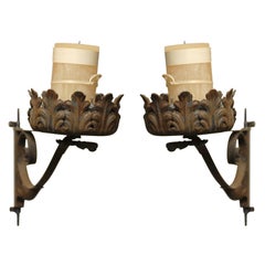 A Pair of Iron Candelabres, Sconces, or Planters