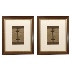A pair of Chocolate and White Silk Chinese Textiles Framed