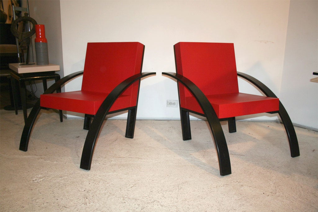 Pair of Parigi chairs by the late Italian architect Aldo Rossi for Unifor.  In keeping with the manner of his architecture (Rossi used basic geometric forms in a playful way): the seat and backrest are two squares made of PVC foam, with curved