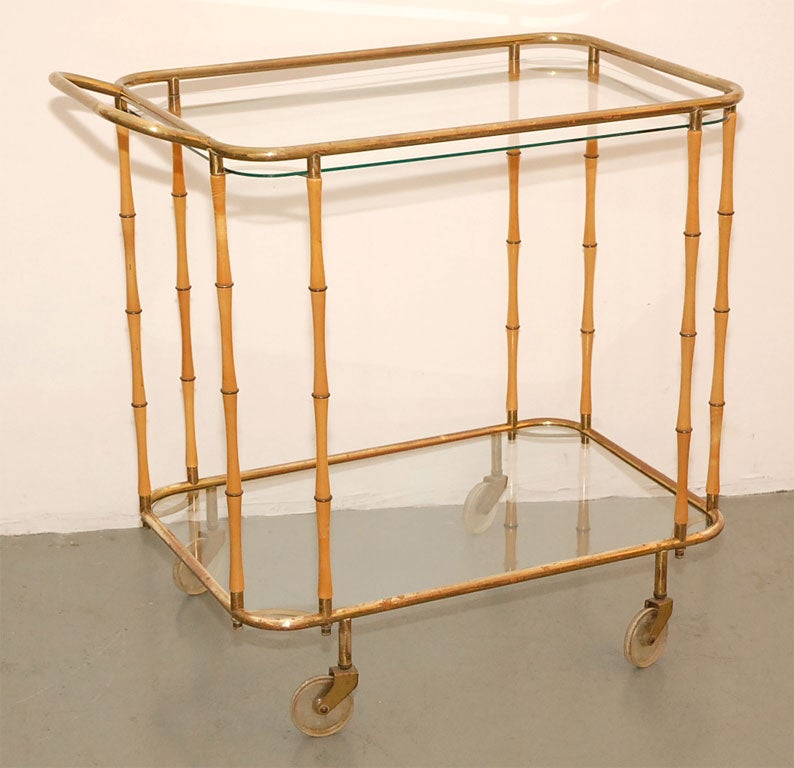 Bamboo and brass rolling barcart with great patina and detailing.