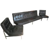 Leather sofa and pair of chairs by Florence Knoll