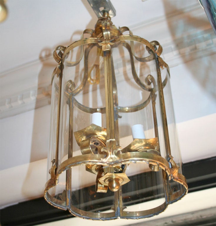 exquisitely curved bronze hall lantern